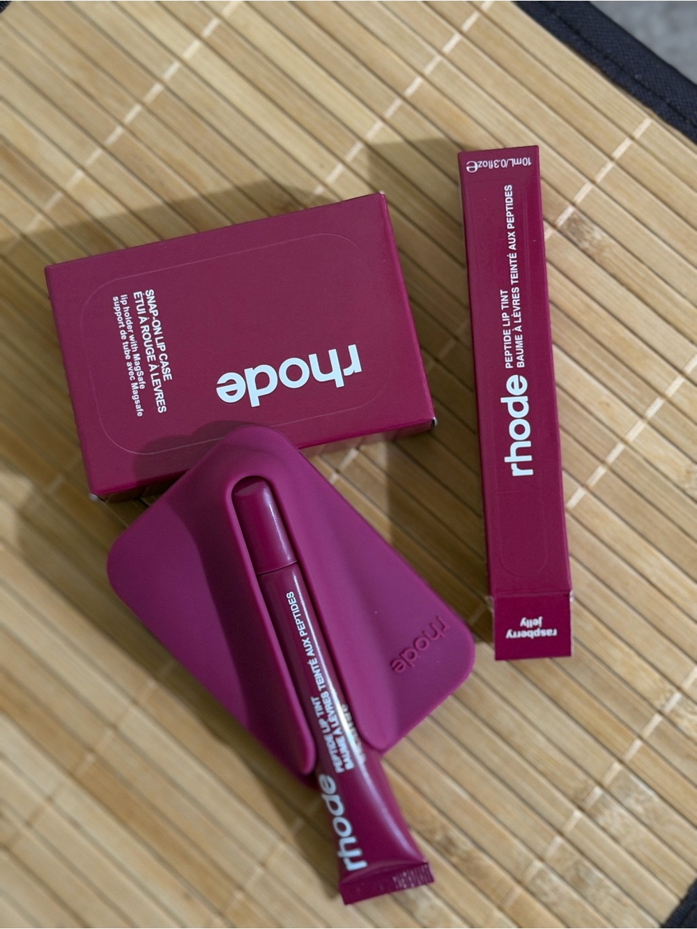 Rhode lip tint and snap-on lip case set in raspberry jelly